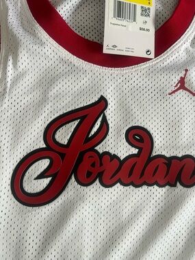 Jordan Women’s White Muscle Tee with Red Script